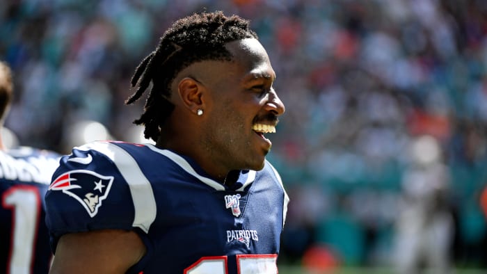 NFL receiver Antonio Brown smiles in a Patriot uniform
